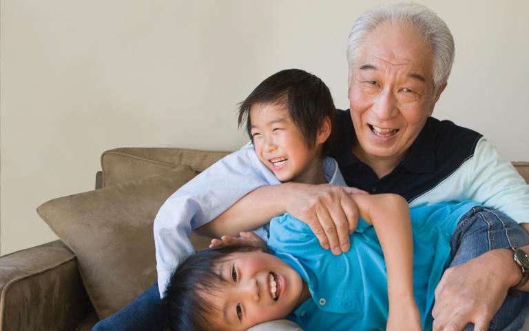 Grandfather with two kids