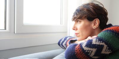 Woman looking outside the window